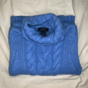 Blue knitted turtleneck